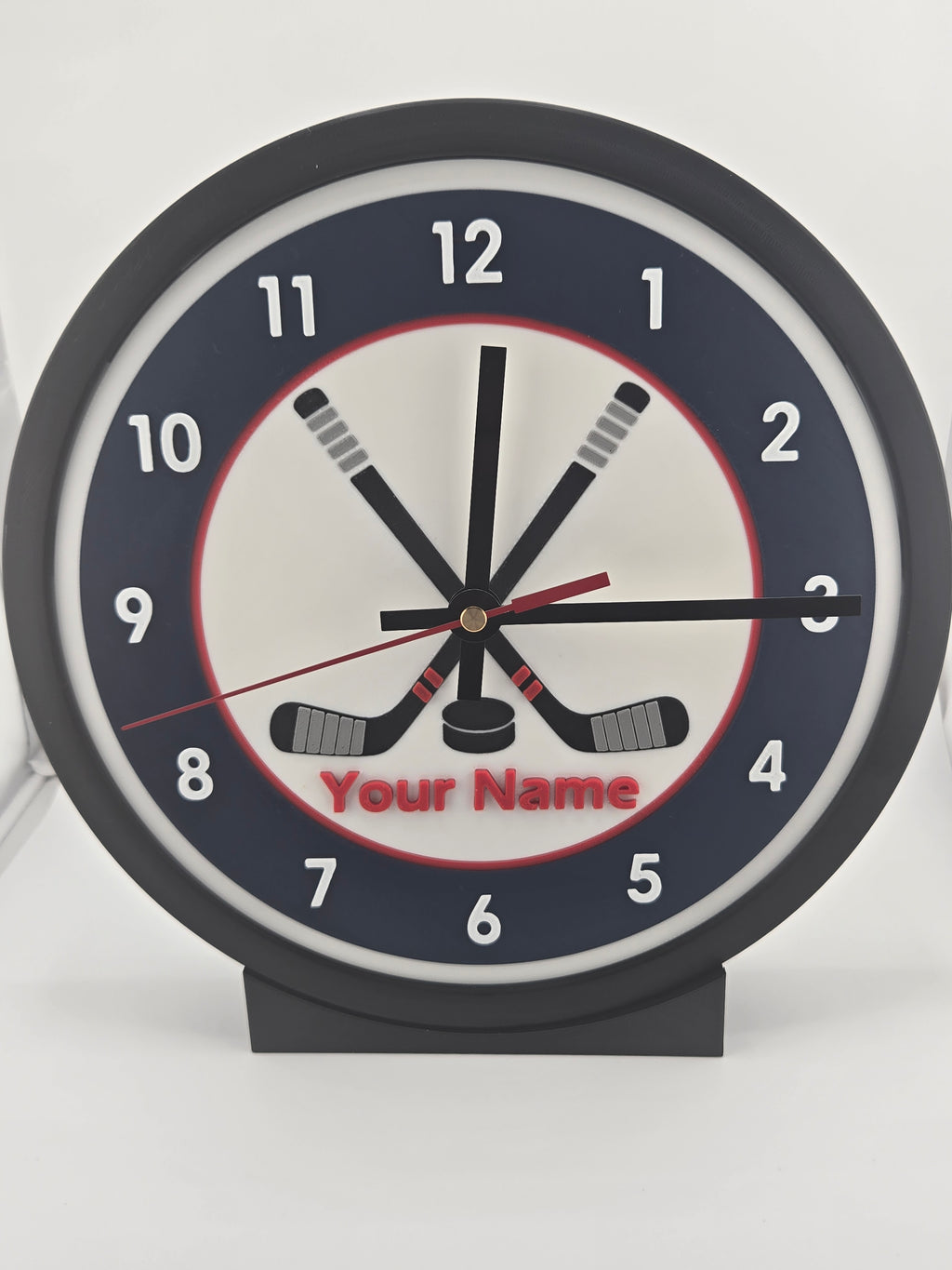 Physical production photograph of the personalized Hockey illuminated modular clock