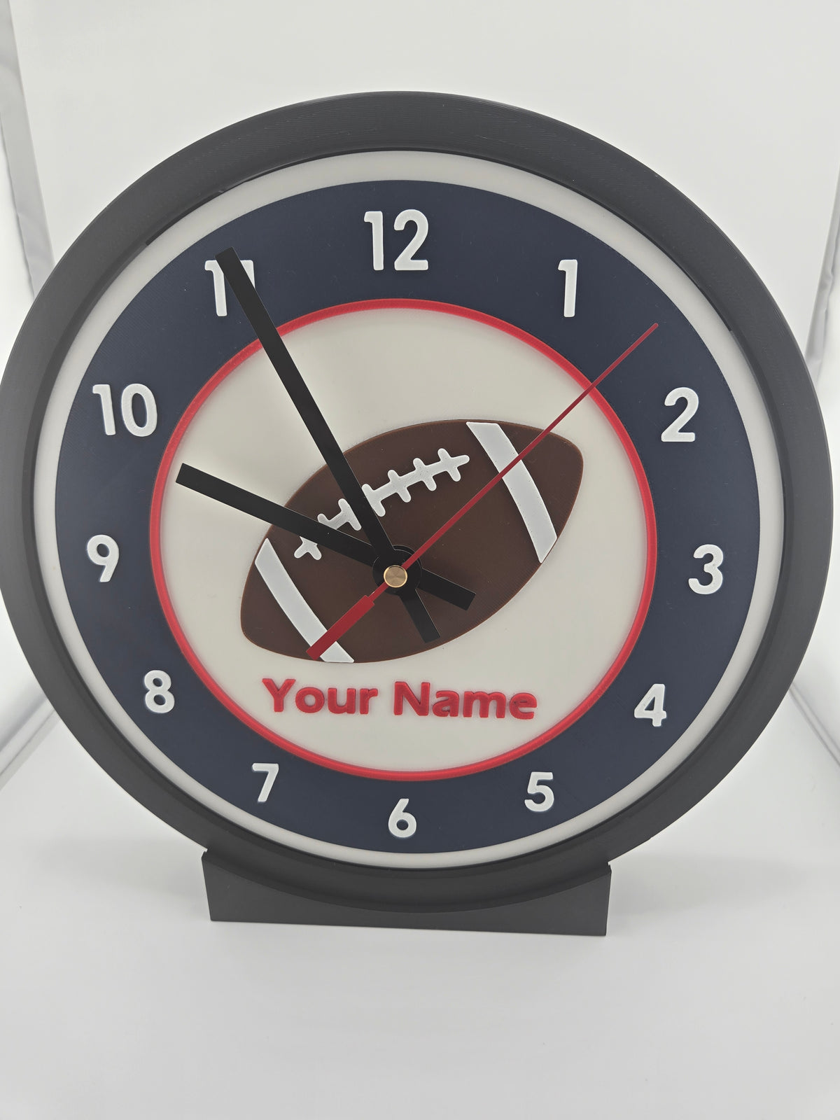 Physical production photograph of the personalized Football illuminated modular clock