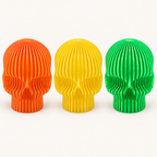 All three Modern Skull LED Tealight Holders: orange, yellow and green